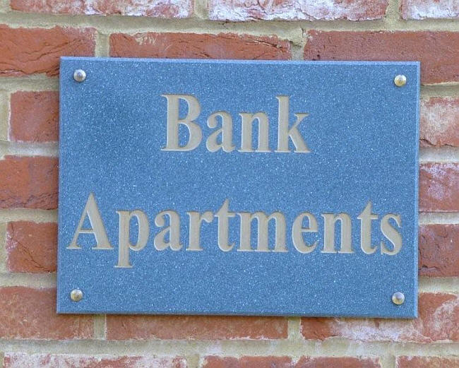 Bank Apartments sign - in May 2013