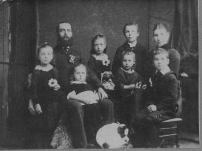 The Bacon family. Richard and Caroline Bacon with Richard's daughter Miriam, Caroline's sons William and Harry Moss, and their 3 surviving daughters Ethel, Florence and Laura. We think that Flo is the girl on the left, and Miriam is the girl at the back.