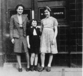  The publican�s daughters on the doorstep of the Carlton Tavern, I would estimate Sadie would have been about 25, with Alma to the right aged 15 and my Mum (Joan) to the left about 18 - circa 1943.