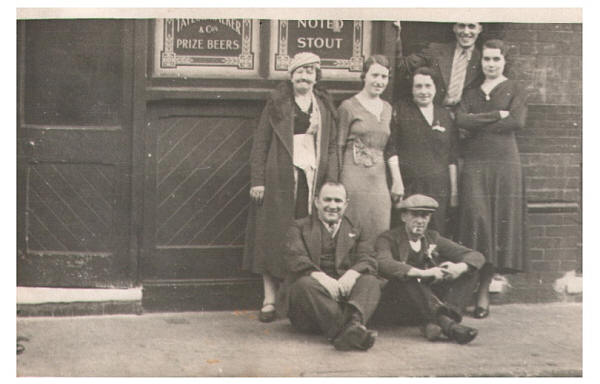 My uncle Arthur Gales his wife, mother and sister outside the Plough, 144 White Horse Road - circa 1940. 