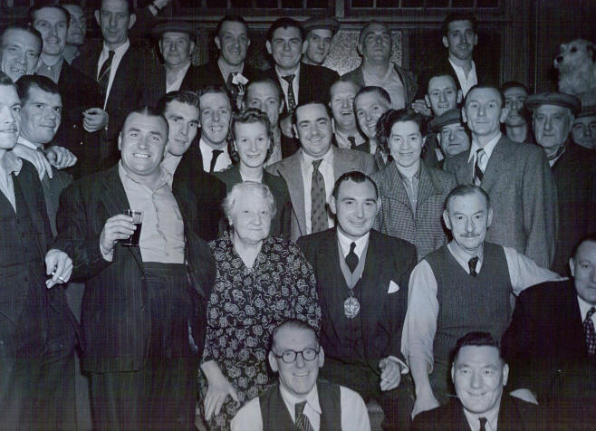 Richard Cobden Festival Dart Match 1951 – W.G. Humphries JP Mayor of Stepney”. On the back it says “Mr Reay”. Alice Reay is the woman sitting next to the Mayor.