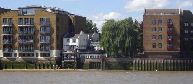 Prospect of Whitby, 57 Wapping Wall - in May 2022 from the Thames Uber boat