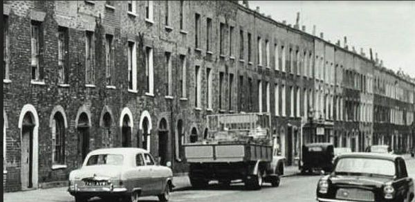 The Protector, 63 Rahere Street, St Luke in 1959 with a lantern
	hanging outside, looking towards City Road.