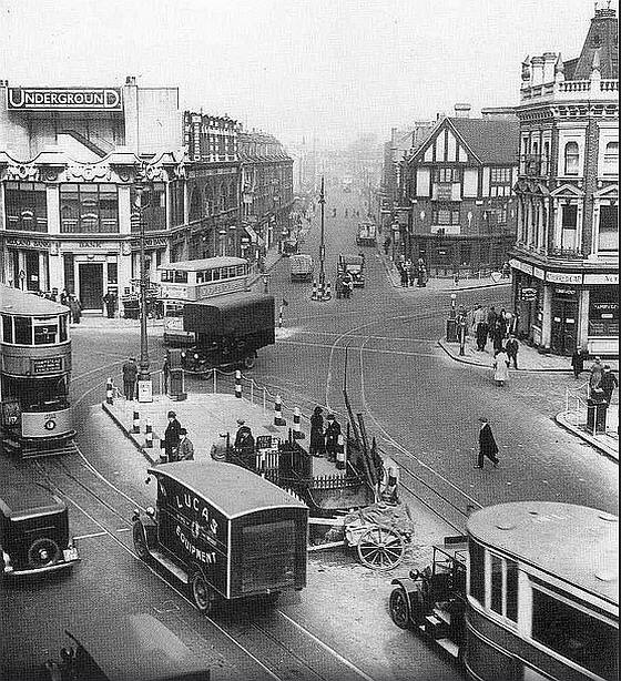 Mother Red Cap (right) and Halfway House (centre/right), looking towards Kentish Town Road from Camden High Street. - circa 1930