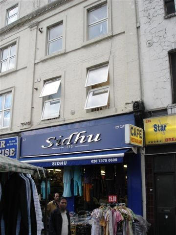 Old Red Lion, 217 Whitechapel Road - formerly the Red Lion & formerly at 103 Whitechapel Road. The Pub closed in 1991 - premises now in use as a shoe shop - photo taken August 2006.