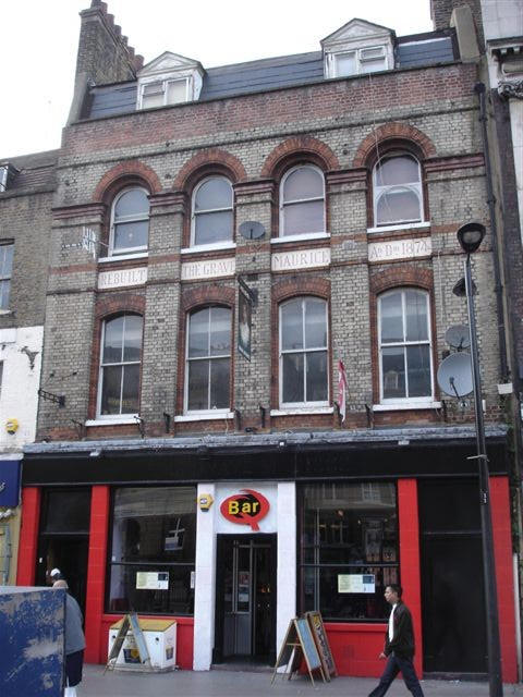 Grave Maurice, 269 Whitechapel Road, formerly at 128 Whitechapel Road. This pub was re-built in 1874 in its present form. It is still open and has officially been called "The Q Bar at the Grave Maurice" since 2004.