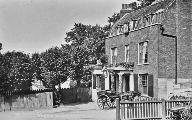 The Cock & Hoop, West End Lane, near the junction with West End Green, circa 1900.