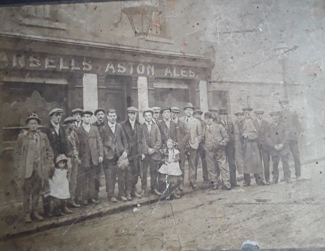 Malt Shovel, 12 Palmer Street, Aston, Birmingham - circa 1920. My grandfather  is 6th from the left, with cap and moustache. My mother is the little girl centre with ribbons.